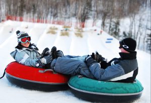 Get your heart pumping with the all thrill, no skill fun of snow tubing. Fly down 5 big chutes and one magic carpet to whisk you back up to the top fast!